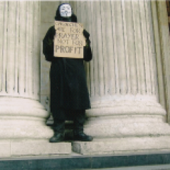 Highlighting religions support for the unjust economic system: Outside St. Pauls Cathedral London.